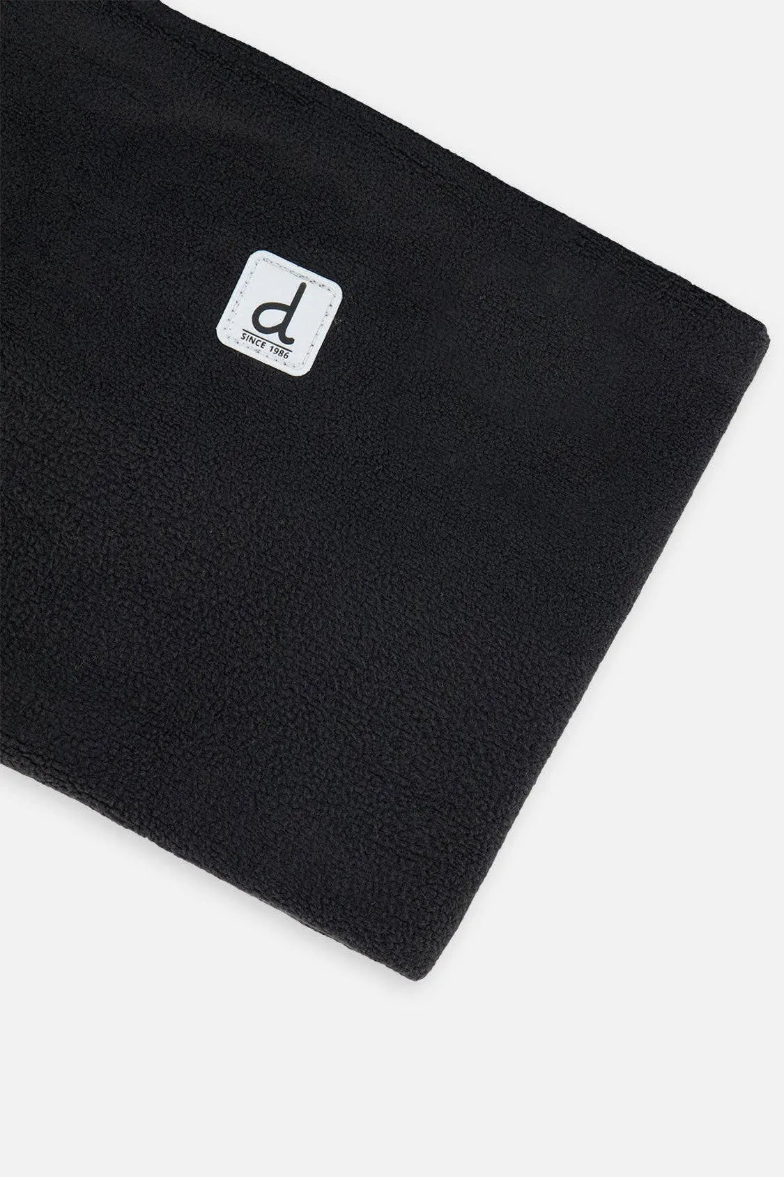 Close view of the Black polar fleece texture and Deux par Deux logo patch